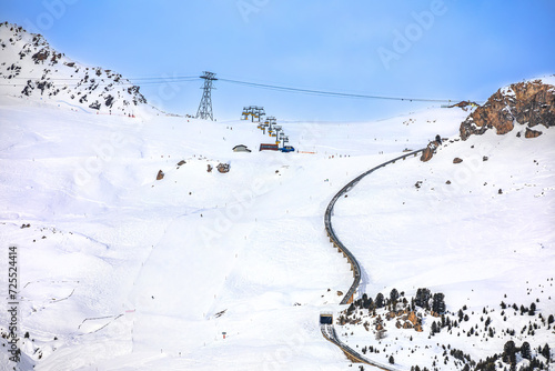 Obraz na płótnie Town of Sankt Moritz luxury winter ski slope and cogwheel track view w salonie