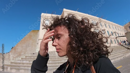 Female walk outside the cellhouse yard on Alcatraz island photo