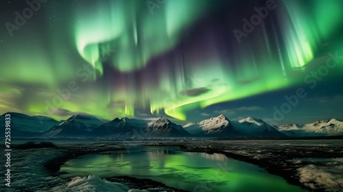 Aurora borealis, northern lights over the fjord and mountains