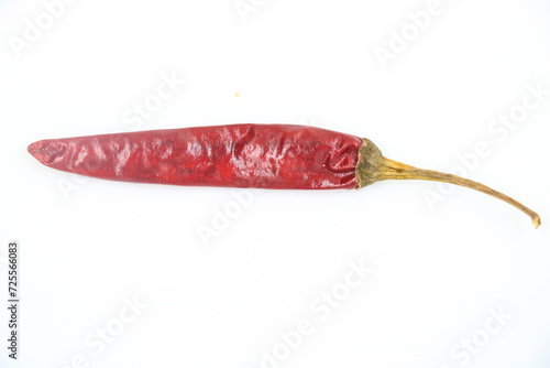 Single dried red chili peppers, spices,peper, paprika for seasoning food on white background