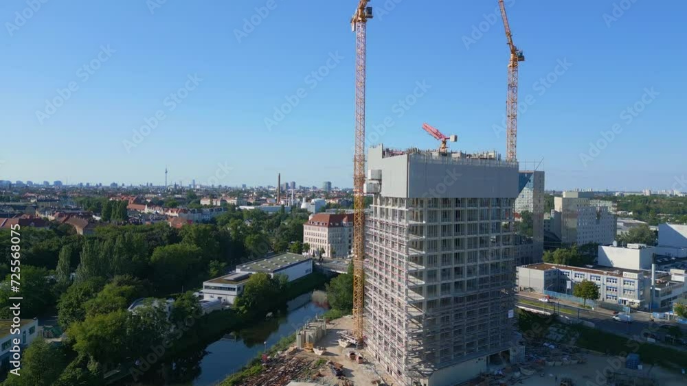 Berlin city construction crane on skyscraper Fantastic aerial view flight drone Berlin city construction crane on skyscraper Fantastic aerial view flight drone