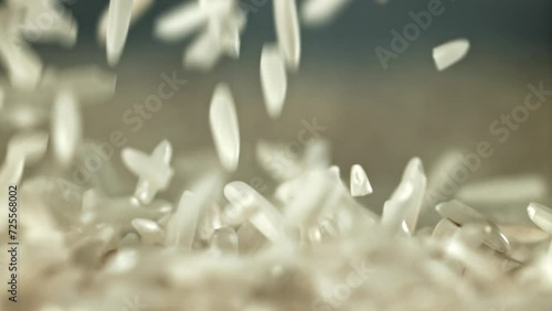 Falling rice grains. Filmed on a high-speed camera at 1000 fps. High quality FullHD footage photo