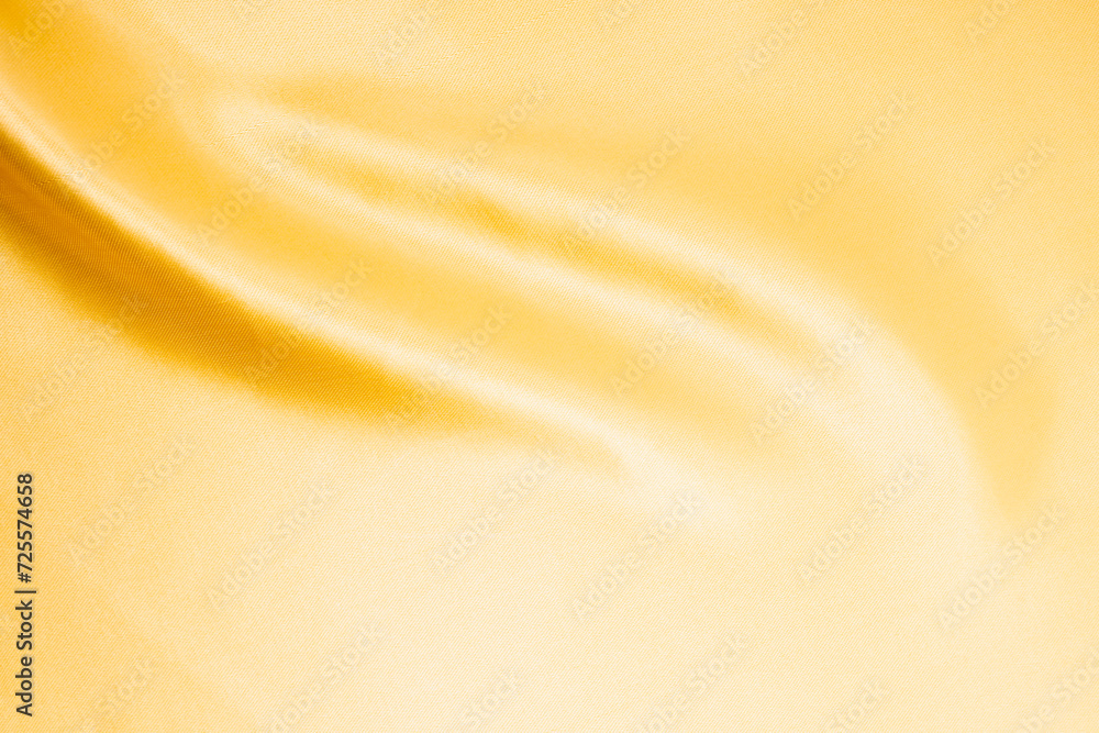 Gold color of satin textured background. Gold color of satin textured background.