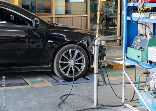 Brake test performance front wheel drive in a car laboratory with the tire rolling.