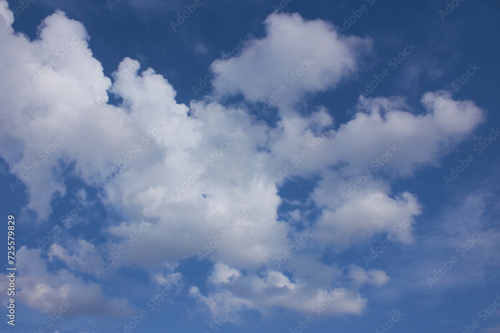 Summer evening sky in the picturesque clouds, lit by the rays of the setting sun. Summer evening sky in the picturesque clouds, lit by the rays of the setting sun.