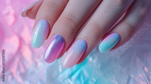 Close-up of hands displaying holographic manicure with gradient effect