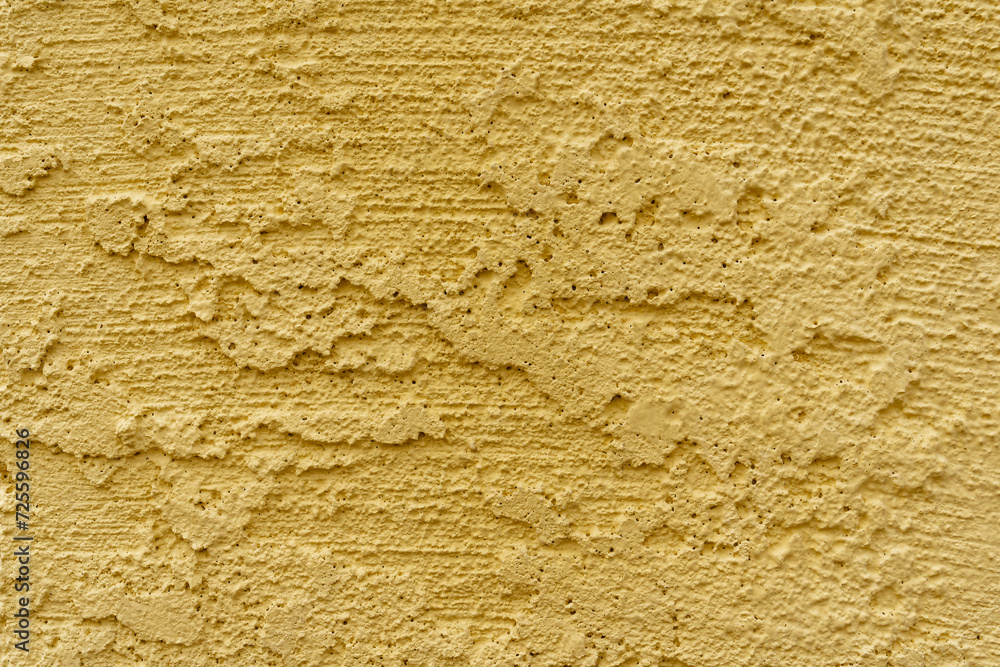 high texture yellow stucco cement background