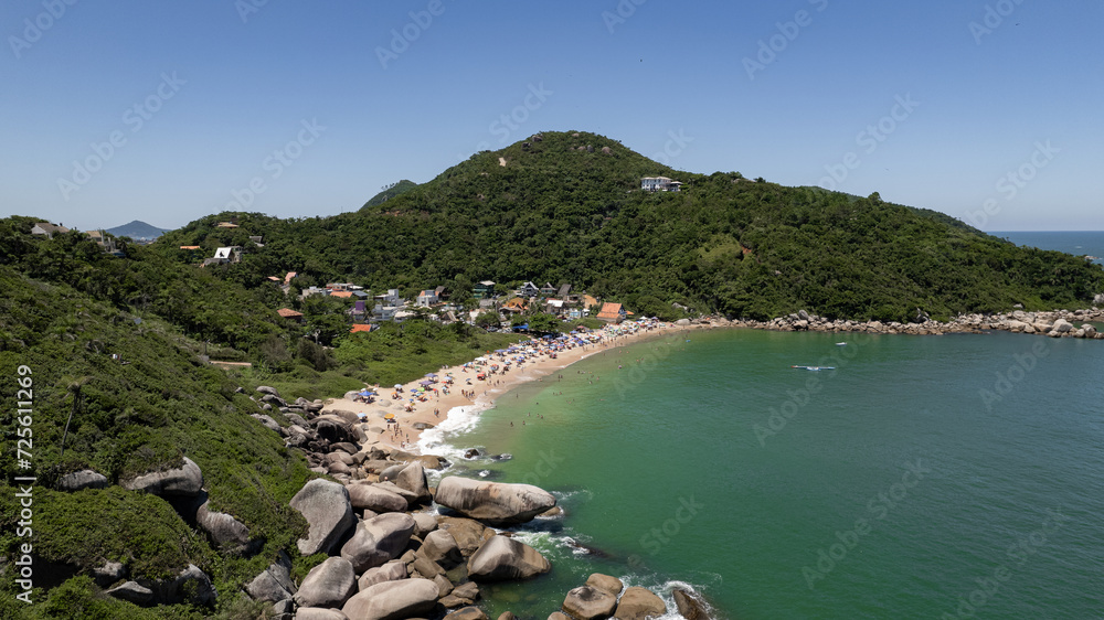 aerial image of Tainha beach in Bombinhas, coast of Santa Catarina, southern Brazil, sunny day, green sea water