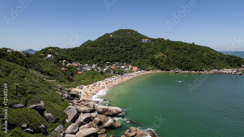 Obraz na płótnie aerial image of Tainha beach in Bombinhas, coast of Santa Catarina, southern Brazil, sunny day, green sea water w salonie