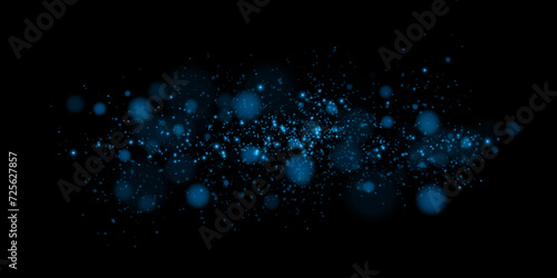 Bokeh, dust sparks and blue stars shine with special light. Vector sparks on black background. Christmas light effect. Sparkling magic dust particles. © andreu1990