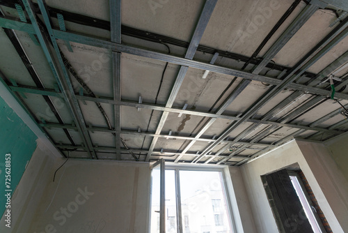 structure of ceiling suspension, installation of gypsum plasterboard and light.
