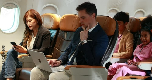 Stewardess taking care passenger. Cabin crew, air hostess working in airplane. Service mind. beautiful flight attendant working in airplane cabin