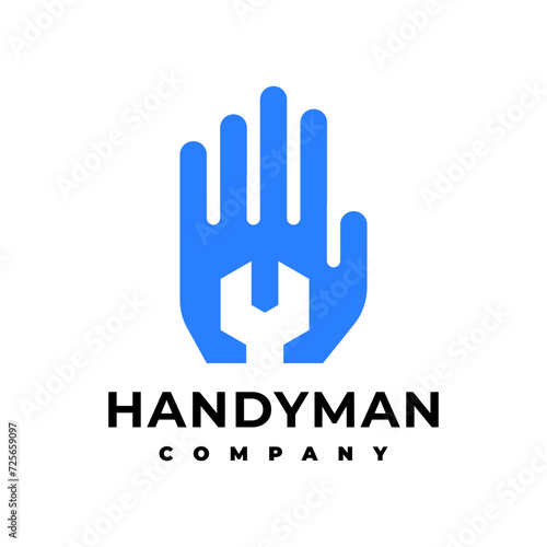 illustration of a hand with a wrench. handyman logo vector template. © Mohha Stock