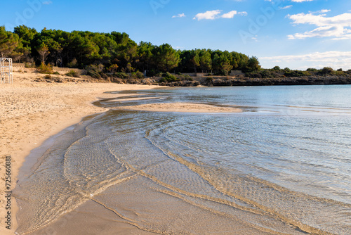 Fototapeta Naklejka Na Ścianę i Meble -  la spiaggia di marina di pulsano durante la bassa marea - Salento, Taranto, Puglia, Italia