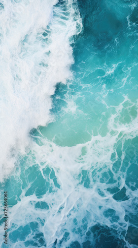 Aerial view of ocean waves in turquoise water. Nature background
