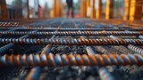 Macro shot of steel rebar being laid in a foundation, showcasing the strength and structure in construction
