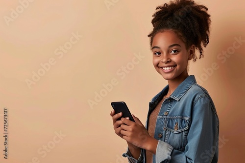 a girl holding a phone photo