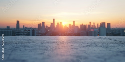 A stunning view of a city skyline at sunset. Perfect for adding a touch of urban beauty to any project © Fotograf