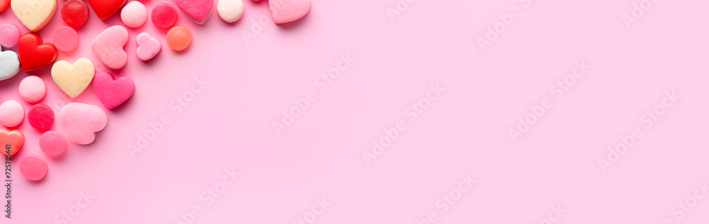 Heart shaped candies, flat lay, top view, empty space. Candies of different shapes on a pink background. Chewing gum for Valentine's Day Heart shaped candies, flat lay, top view, empty space. Candies of different shapes on a pink background. Chewing gum for Valentine's Day