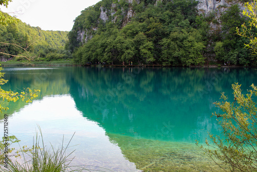 Azure Crystal Clear Water Of Lake. Lake Trails. Lake Hikes. Area of Outstanding Natural Beauty. Plitvice Lakes National Park