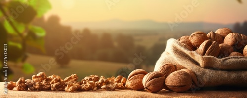 A bag of walnuts with nature background on wooden mat, panorama. Generative Ai. photo