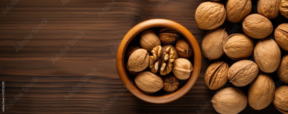 Top view of walnuts in a bowl on rustic table, healthy food panorama. Generative Ai. Top view of walnuts in a bowl on rustic table, healthy food panorama. Generative Ai.