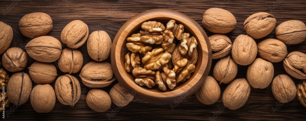 Top view of walnuts in a bowl on rustic table, healthy food panorama. Generative Ai. Top view of walnuts in a bowl on rustic table, healthy food panorama. Generative Ai.