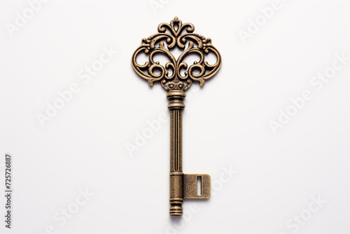Old Key on white background. Vintage ornate brass key,