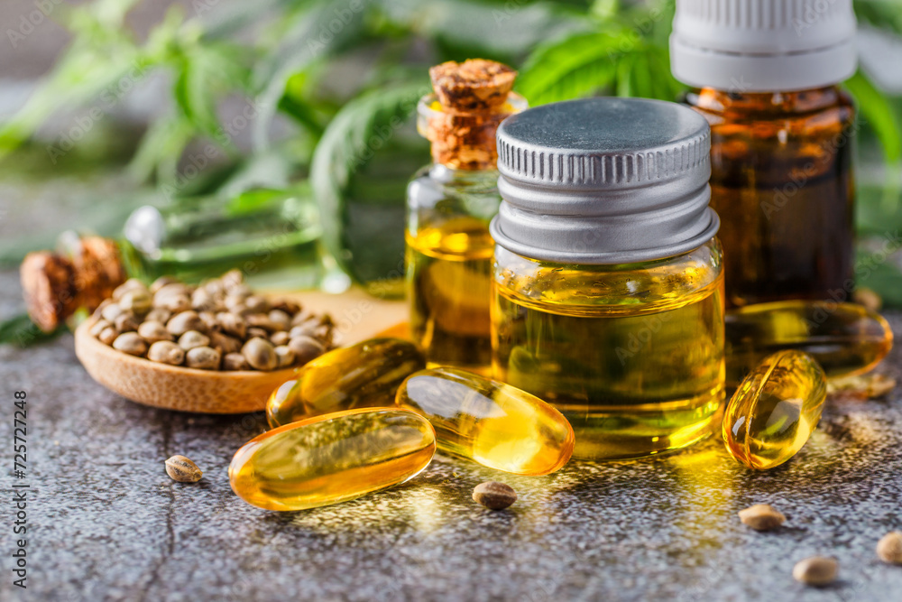 Green leaves of medicinal cannabis with extract oil.Medical marijuana flower buds. Hemp buds - medical marijuana concept Green leaves of medicinal cannabis with extract oil.Medical marijuana flower buds. Hemp buds - medical marijuana concept