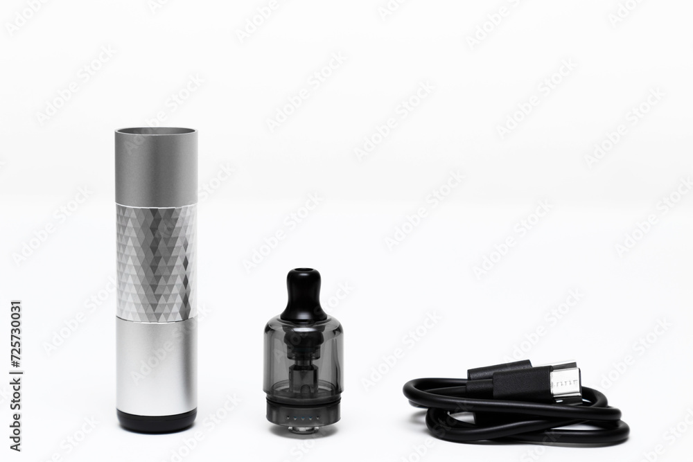 Opened vaping device, vape, pod, kit silver color with charging cable ...