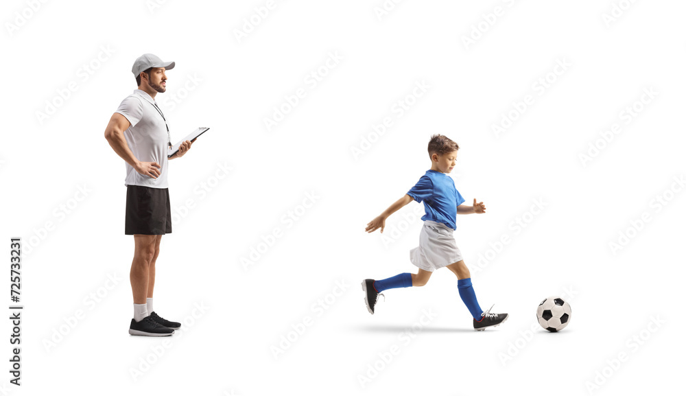 Football coach watching a boy at training