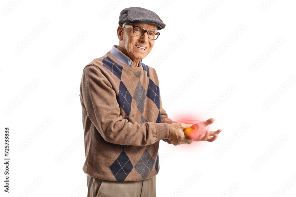 Elderly man in pain holding his inflamed red hand wrist Elderly man in pain holding his inflamed red hand wrist
