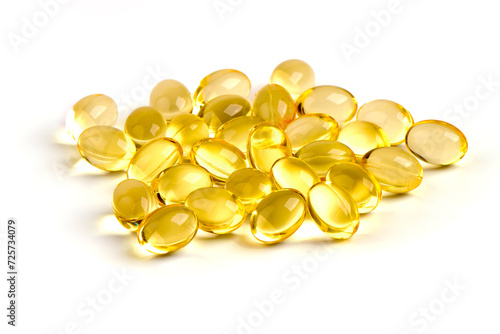 Fish oil supplement fish shape capsules, isolated on white background.