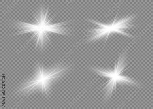 White glowing light explodes on a transparent background. Sparkling magical dust particles. Bright Star. Transparent shining sun. White star