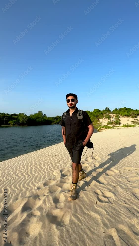 person walking on the beach Sukabumi, Indonesia person walking on the beach Sukabumi, Indonesia