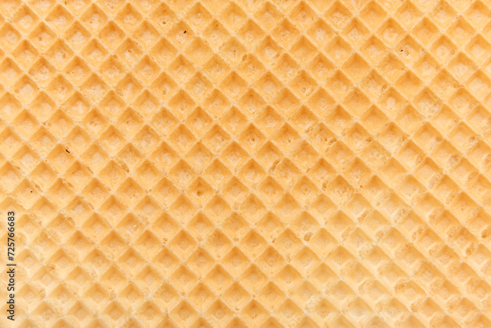 Waffle texture close up. Wafer sheet. homemade baking Waffle texture close up. Wafer sheet. homemade baking