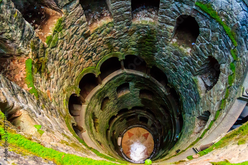 Initiation Well (Inverted tower) at park of Quinta da Regaleira palace in Sintra, Portugal photo
