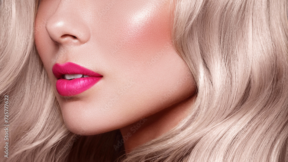 Close up portrait of fashion blonde haired model with stylish pink lips make up. Hair dying Close up portrait of fashion blonde haired model with stylish pink lips make up. Hair dying