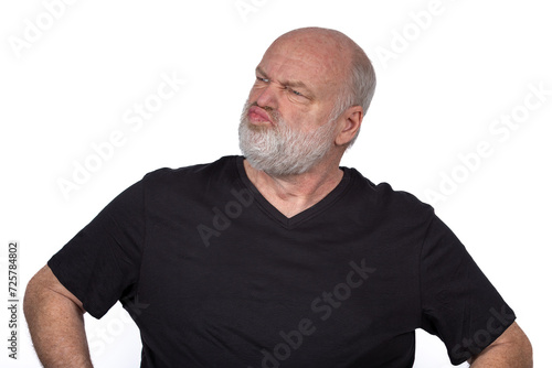 Suspicious Middle-Aged Man in Black T-Shirt - Stylish Portrait on White Background