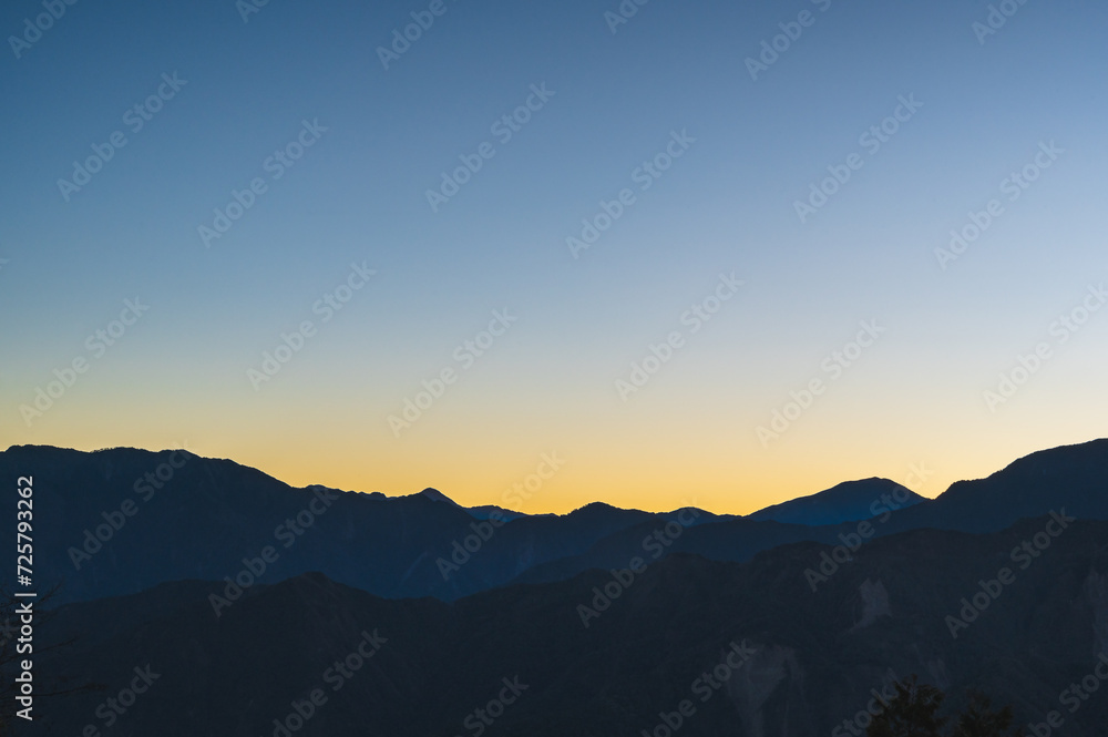 Breathtaking sunrise vista from Alishan Mountain, Taiwan. The Alishan National Scenic Area is a mountain retreat and nature reserve situated in Alishan Township, Chiayi County, Taiwan.