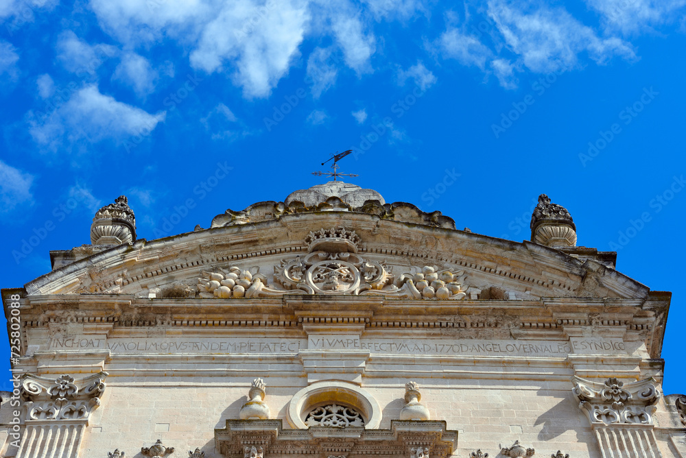 Fototapeta premium Baroque details of the Mother Church of Saints Peter and Paul Galatina Lecce Italy