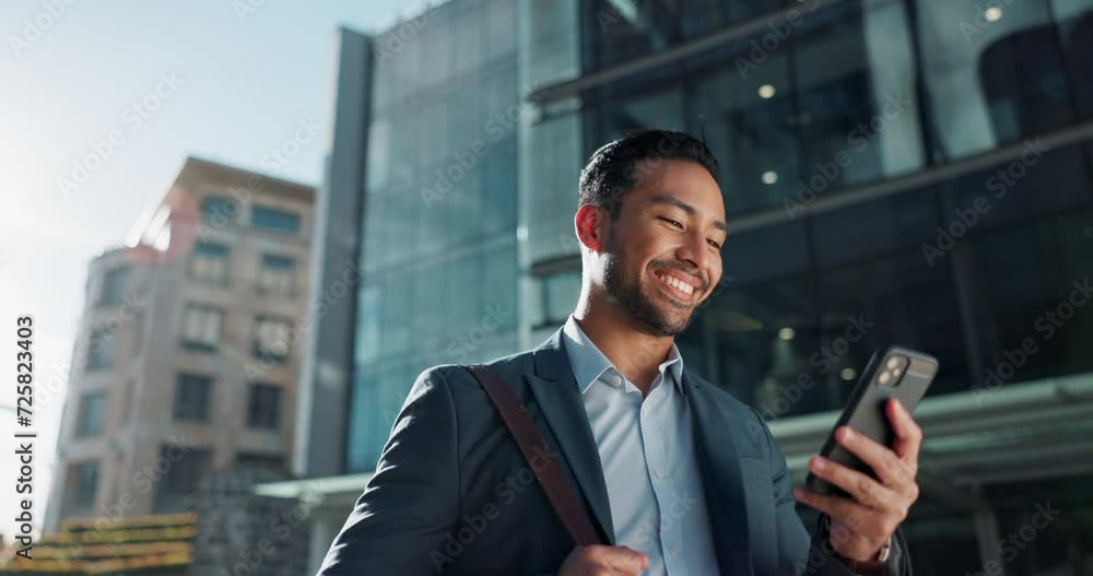 Phone, social media and wind with businessman in city, walking on street or sidewalk for morning work commute. Smile, mobile or contact with happy young employee in urban town for travel journey Phone, social media and wind with businessman in city, walking on street or sidewalk for morning work commute. Smile, mobile or contact with happy young employee in urban town for travel journey