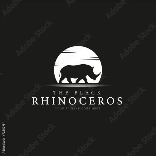 black silhouette logo concept one horn rhinoceros which is a rare and protected animal in the bright moonlight