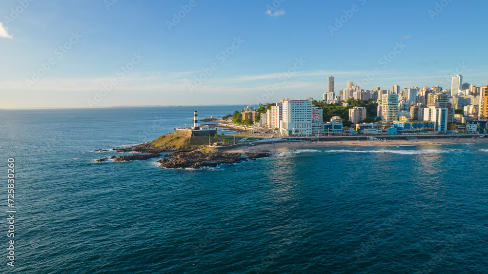 Aerial view by the sea of the Barra Lighthouse in Salvador, Bahia, Brazil