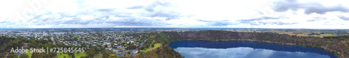 Panoramic Aerial view of Blue Lake is a large, monomictic, crater lake located in a dormant volcanic at Mount Gambier in the Limestone Coast region of South Australia.