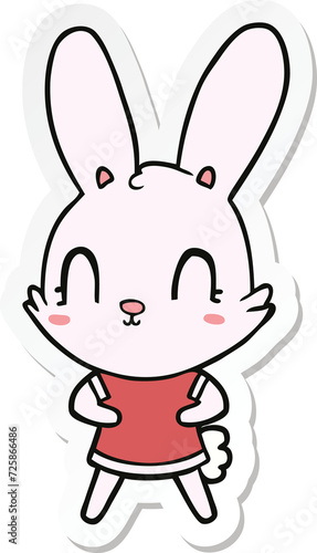 sticker of a cute cartoon rabbit in dress
