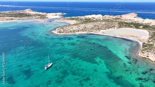 Aerial drone video of Feira a paradise landscape islet of Northern part of Antiparos island, Cyclades, Greece photo