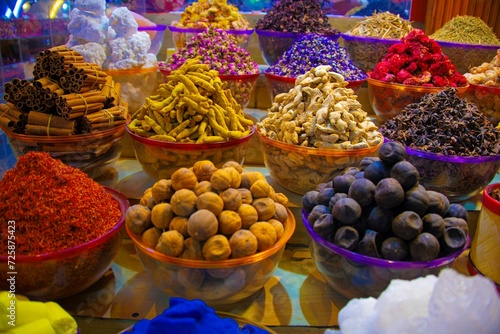 Photography big variation of spices in baskets at the old Souk in Dubai in different colors