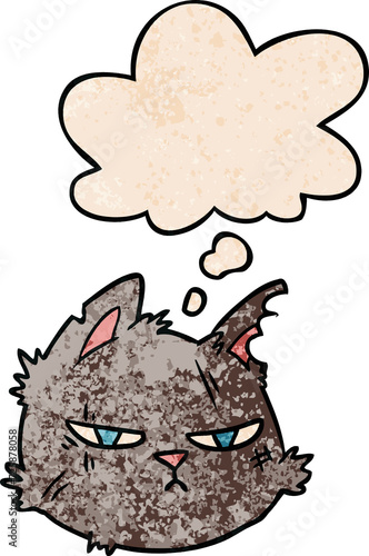 cartoon tough cat face and thought bubble in grunge texture pattern style