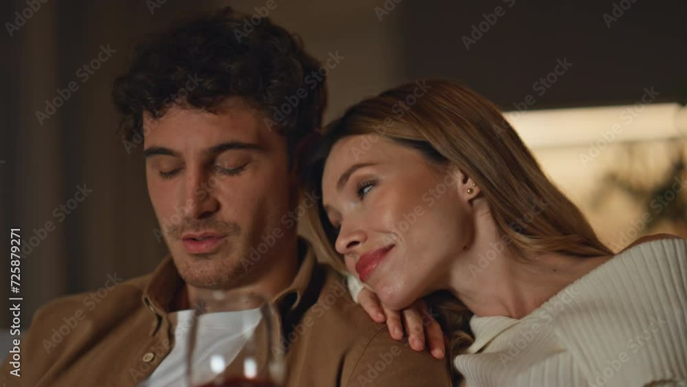 Family couple spending date at home holding wine glasses close up. Happy pair Family couple spending date at home holding wine glasses close up. Happy pair